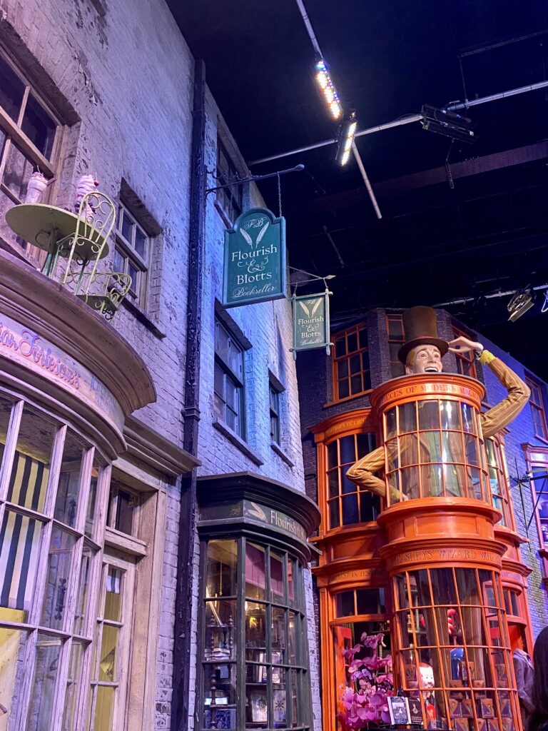 Flourish and Blotts and Weasley Wizarding Wheezes storefronts at Harry Potter Studio London