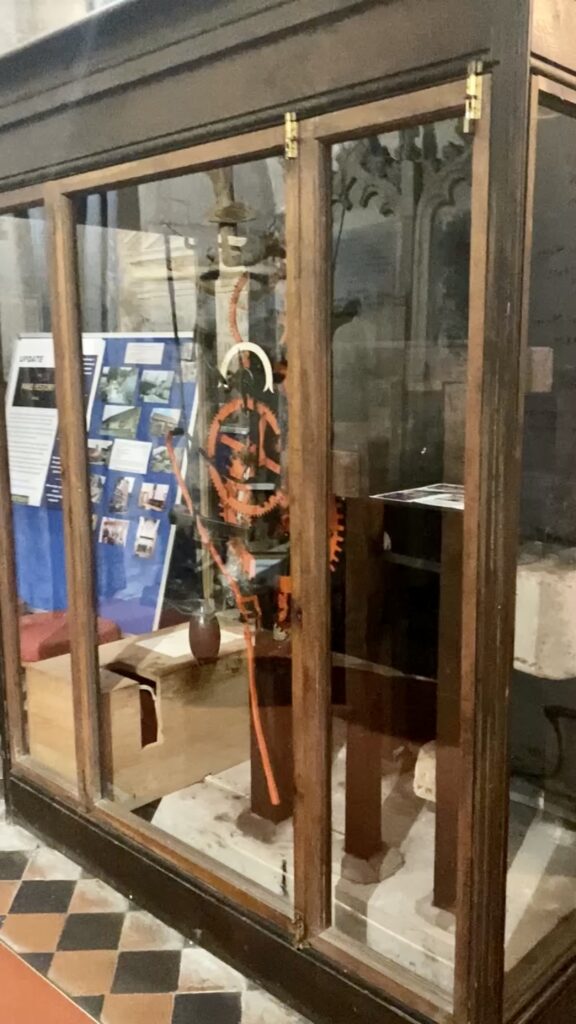 Clock in St Andrews Church Castle Combe